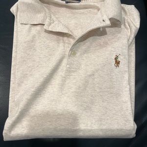 Shirt sleeve Polo by Ralph Lauren shirt. Wore once and dry cleaned.